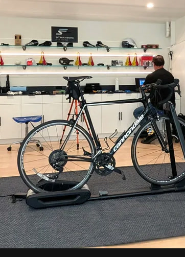 Road bike on a trainer in the fitting studio