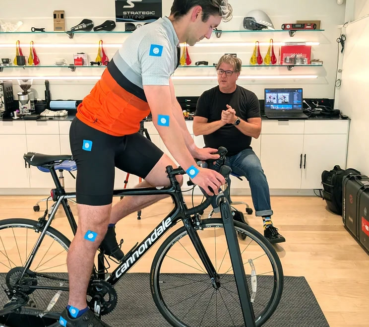 Chris Soden coaching a rider wearing motion sensors