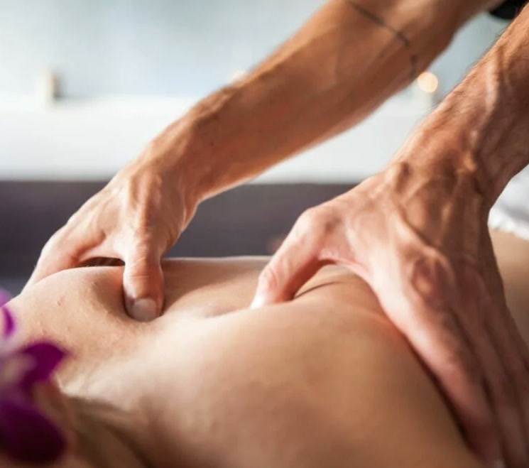 Therapist working on an athlete’s shoulder