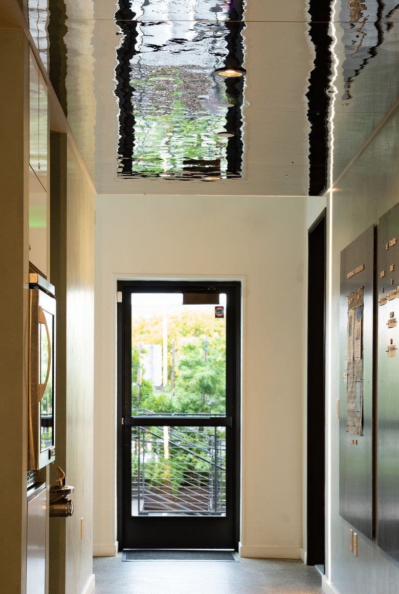 A corridor at the Center under a rippled skylight